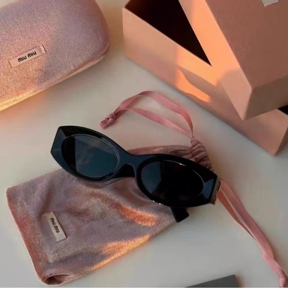 Miu Miu Dark Sunglasses with Pink Accents - Picture 1 of 7